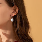Halo Drop Hoop Earrings — VVS Moissanite