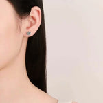 Six-Prong Solitaire Studs — VVS Moissanite